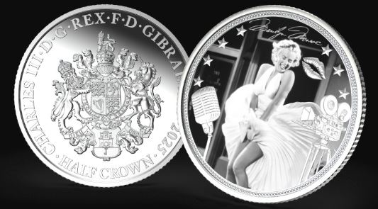 Two silver coins: one with a coat of arms, the other with Marilyn Monroe.