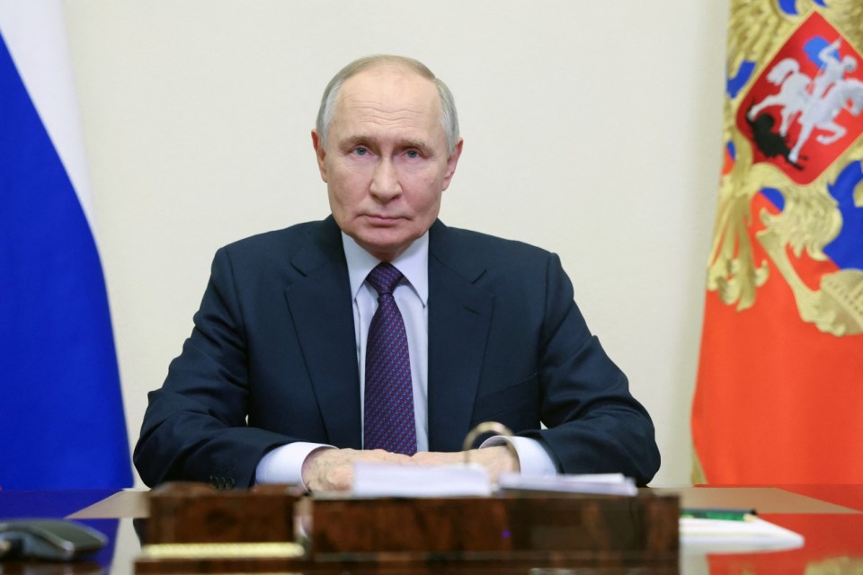 In this pool photograph distributed by Russian state agency Sputnik, Russia's President Vladimir Putin congratulates prosecutors on Prosecutor's Day in Moscow on January 12, 2025. (Photo by Alexander KAZAKOV / POOL / AFP) (Photo by ALEXANDER KAZAKOV/POOL/AFP via Getty Images)
