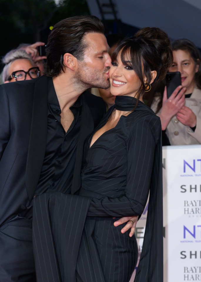 Mark Wright kissing Michelle Keegan at the National Television Awards.