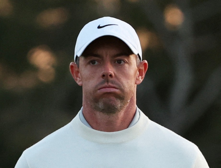Golf - The Masters - Augusta National Golf Club, Augusta, Georgia, U.S. - April 12, 2024 Northern Ireland's Rory McIlroy reacts as he walks off the green on the 18th hole after completing his second round REUTERS/Mike Segar REFILE - CORRECTING ID