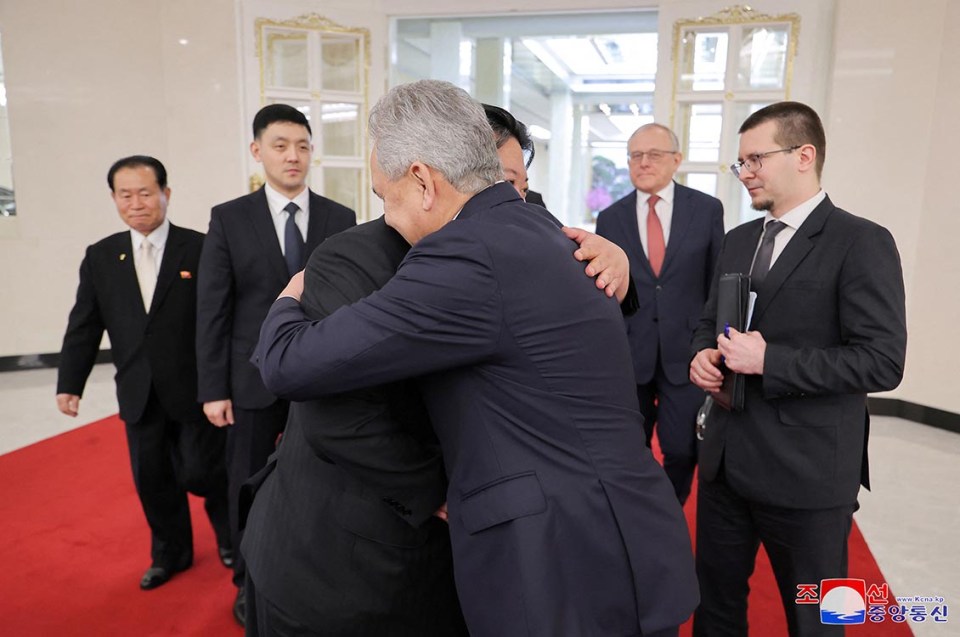 North Korean leader Kim Jong Un welcomes Russian President Vladimir Putin's top security adviser Sergei Shoigu during his visit to North Korea, in this photo released by North Korea's official Korean Central News Agency March 22, 2025. KCNA via REUTERS ATTENTION EDITORS - THIS IMAGE WAS PROVIDED BY A THIRD PARTY. REUTERS IS UNABLE TO INDEPENDENTLY VERIFY THIS IMAGE. NO THIRD PARTY SALES. SOUTH KOREA OUT. NO COMMERCIAL OR EDITORIAL SALES IN SOUTH KOREA.