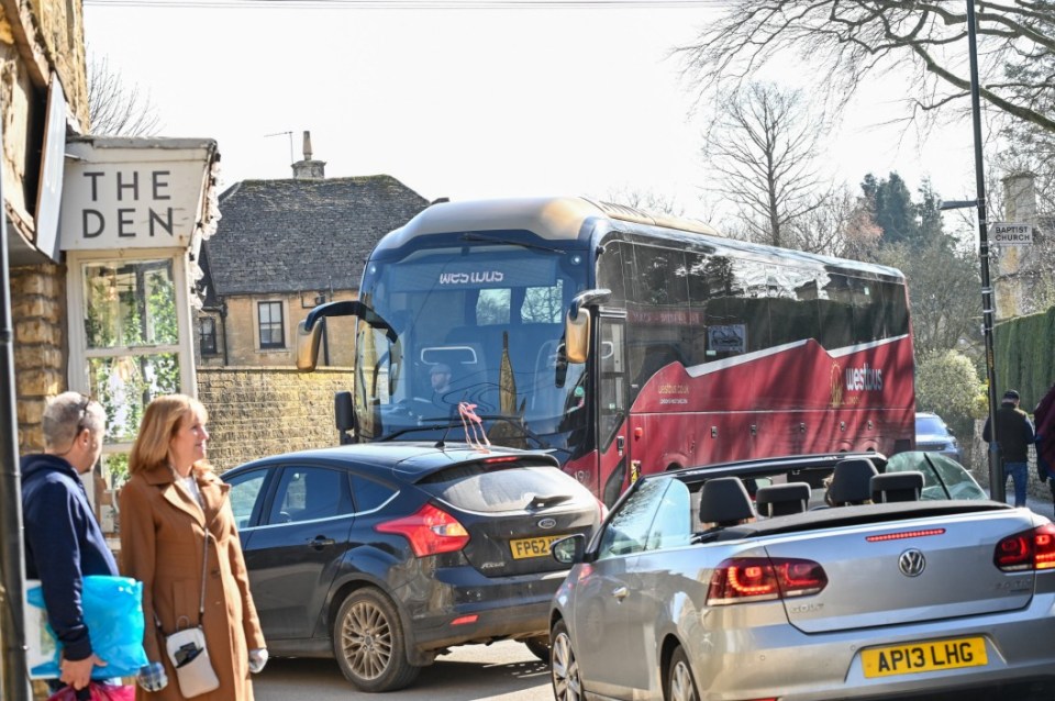 FILE PHOTO - The Cotswold village of Bourton-on-the-Water. March 7 2025. Photo released March 28 2025. Coach operators say they will no longer visit a Cotswolds village - as parking plans have made it 'unsafe.'Officials in Bourton-on-the-Water in Gloucestershire want to tackle ongoing issues involving the huge number of vehicles bringing visitors in for the day.Figures show in one year alone 238,000 people visited the 'Venice Of The Cotswold' by coach or large minibus.Residents say they can't park as there are too many buses but businesses say a bus ban would hit trade and and turn the picture postcard village into a "ghost-town".