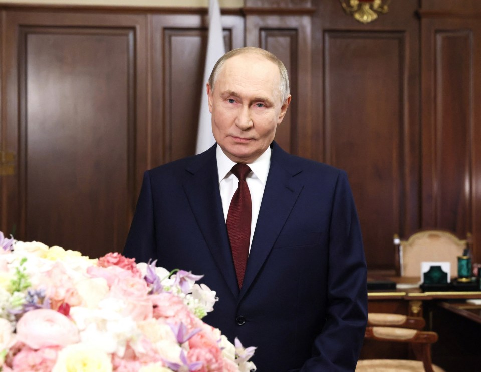 In this pool photograph distributed by Russian state agency Sputnik, Russia's President Vladimir Putin congratulates prosecutors on Prosecutor's Day in Moscow on January 12, 2025. (Photo by Alexander KAZAKOV / POOL / AFP) (Photo by ALEXANDER KAZAKOV/POOL/AFP via Getty Images)
