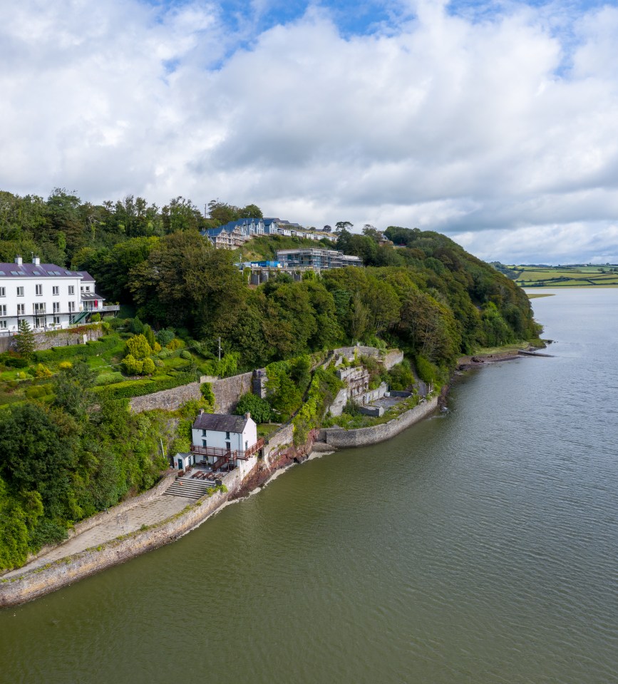 Aerial view of Laugharne, Wales, showing Dylan Thomas's boathouse.