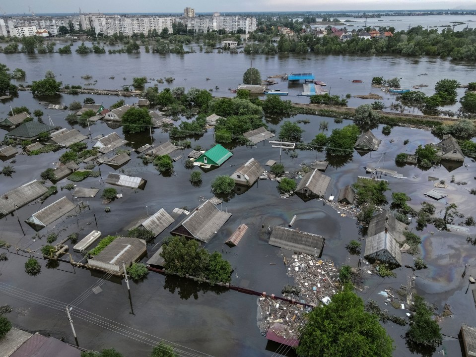 Aerial view of a flooded residential area.