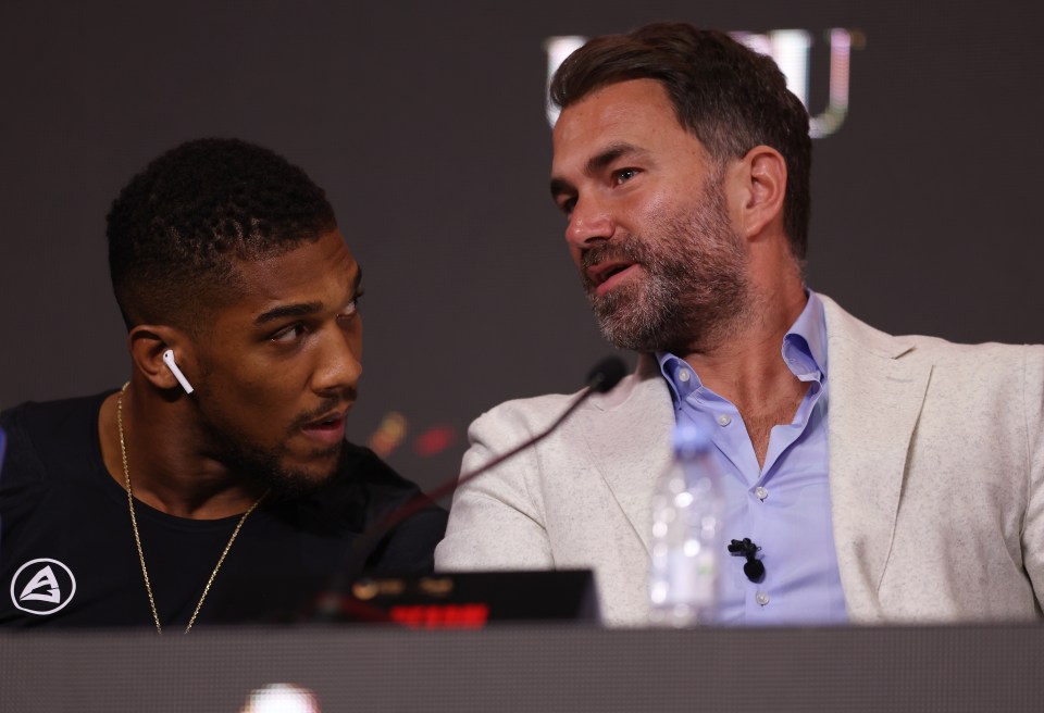 Anthony Joshua and Eddie Hearn at a press conference.