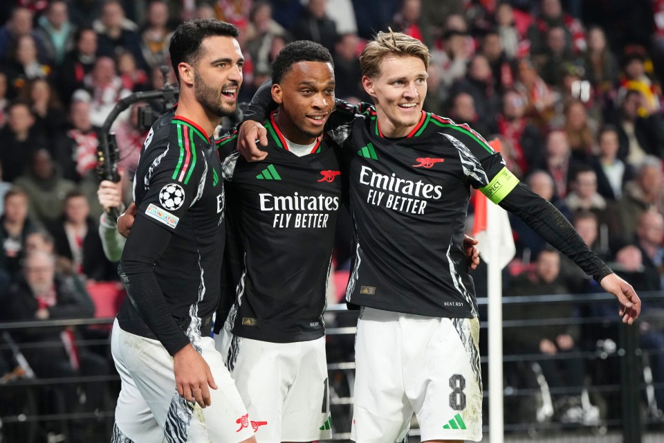 Arsenal players celebrating a goal.