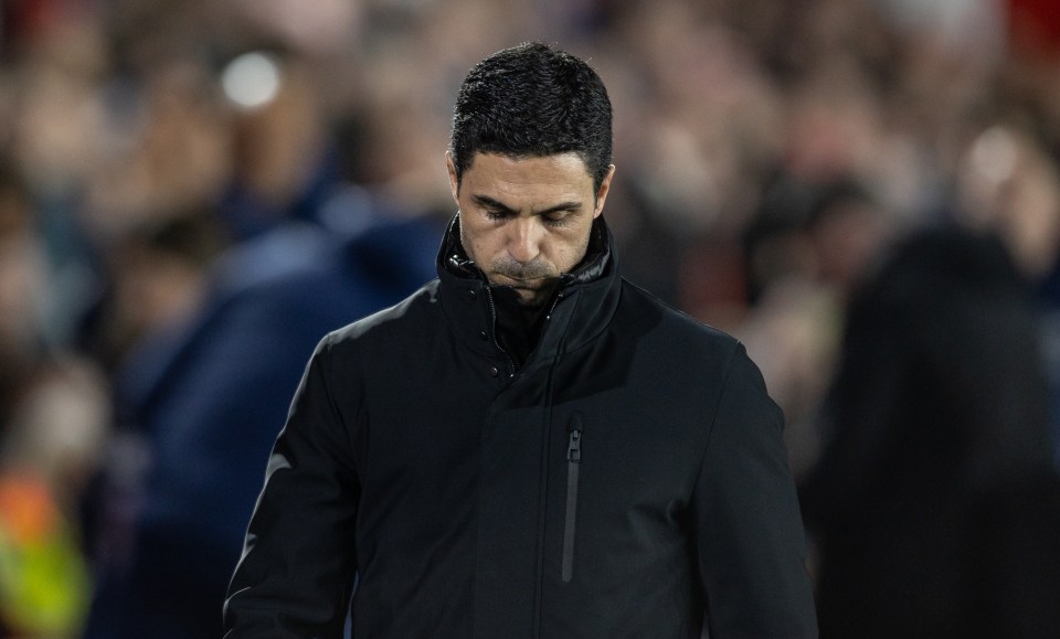 Mikel Arteta, Arsenal's manager, looking down.