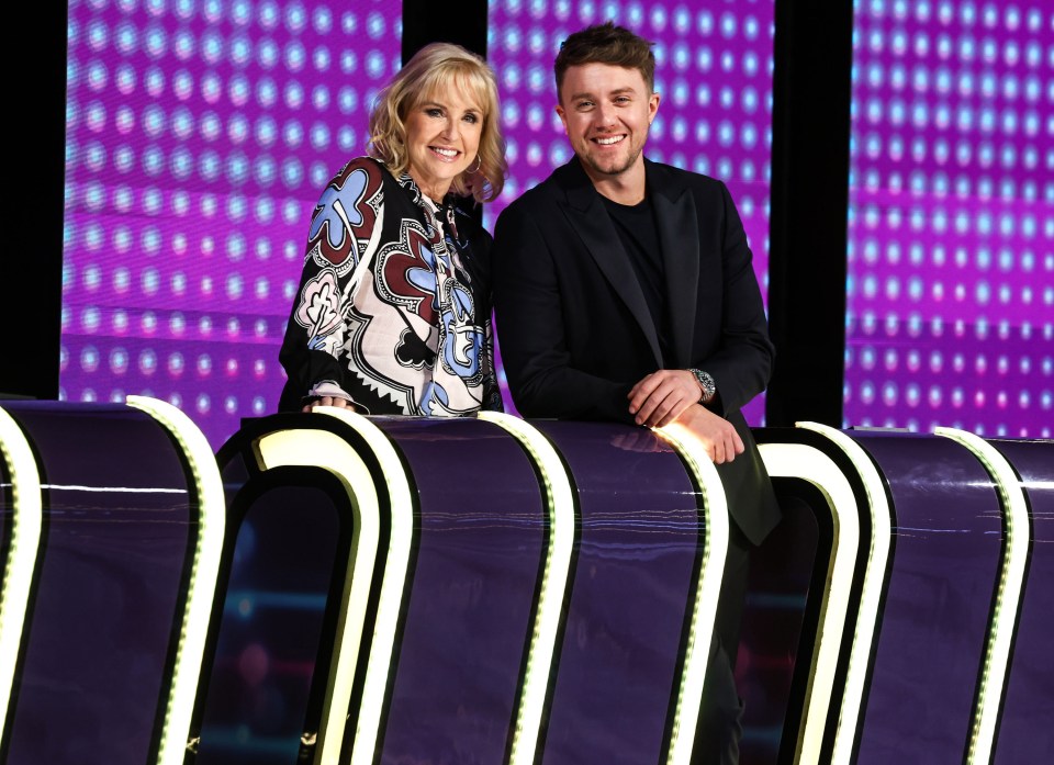 Sarah Greene and Roman Kemp at the Finish Line.