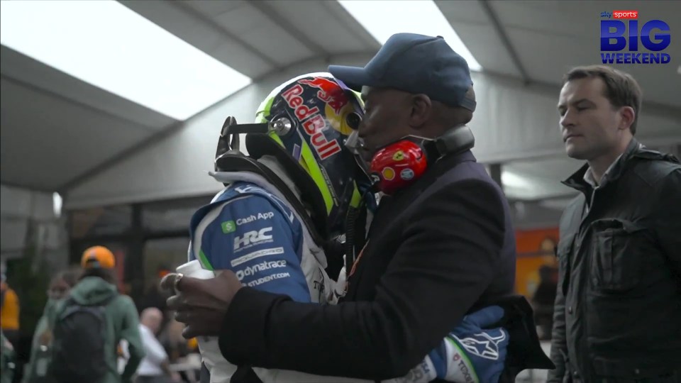 Anthony Hamilton comforting Isack Hadjar after a crash.