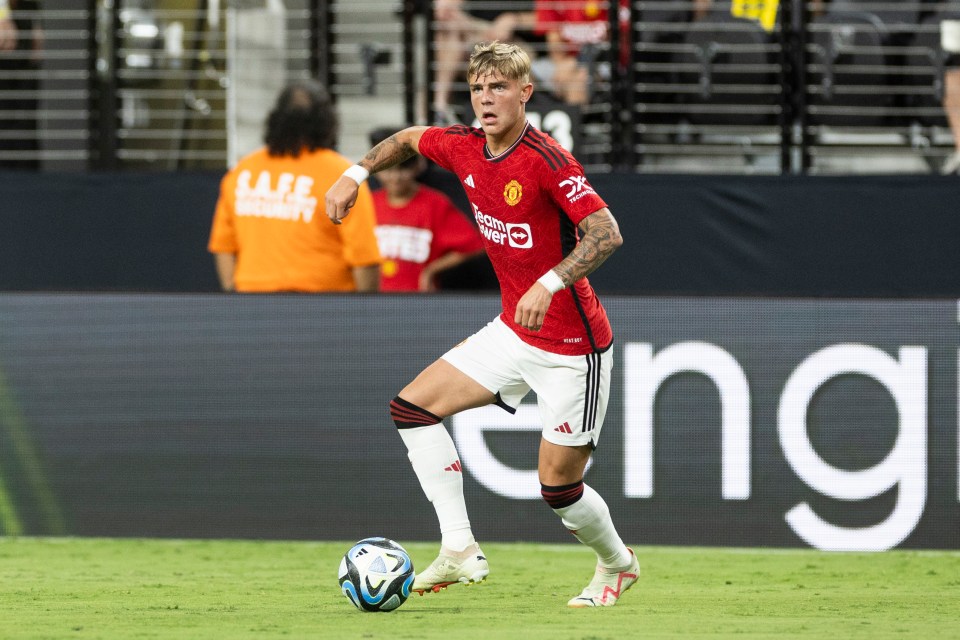 Brandon Williams of Manchester United controlling the ball during a soccer match.