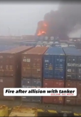 Fire and smoke after a ship collision.
