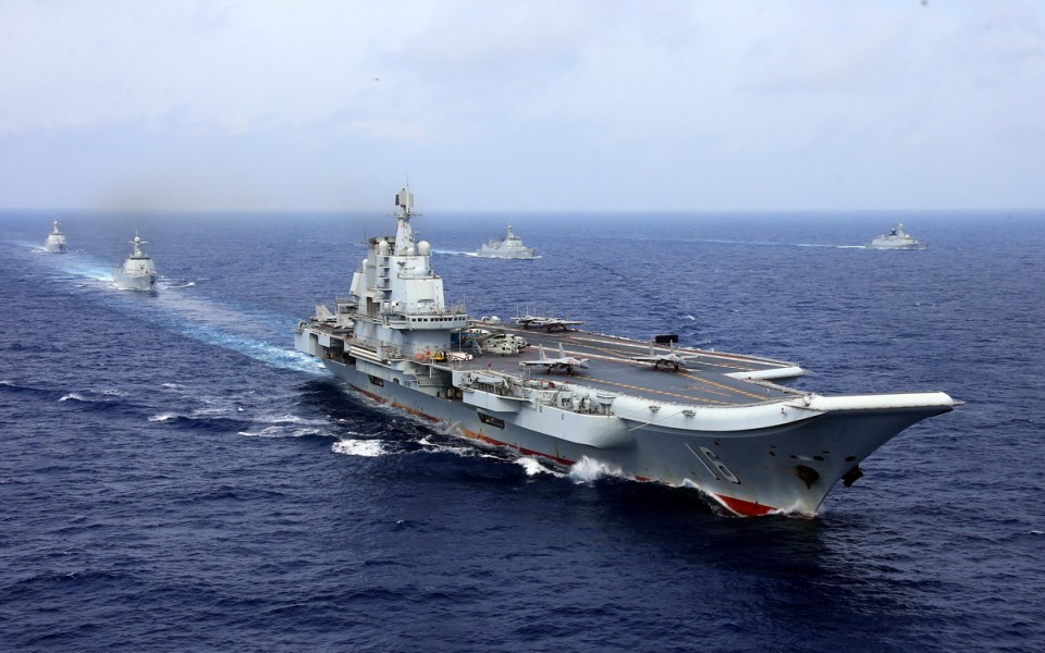 China's Liaoning aircraft carrier and accompanying naval ships during a military drill.
