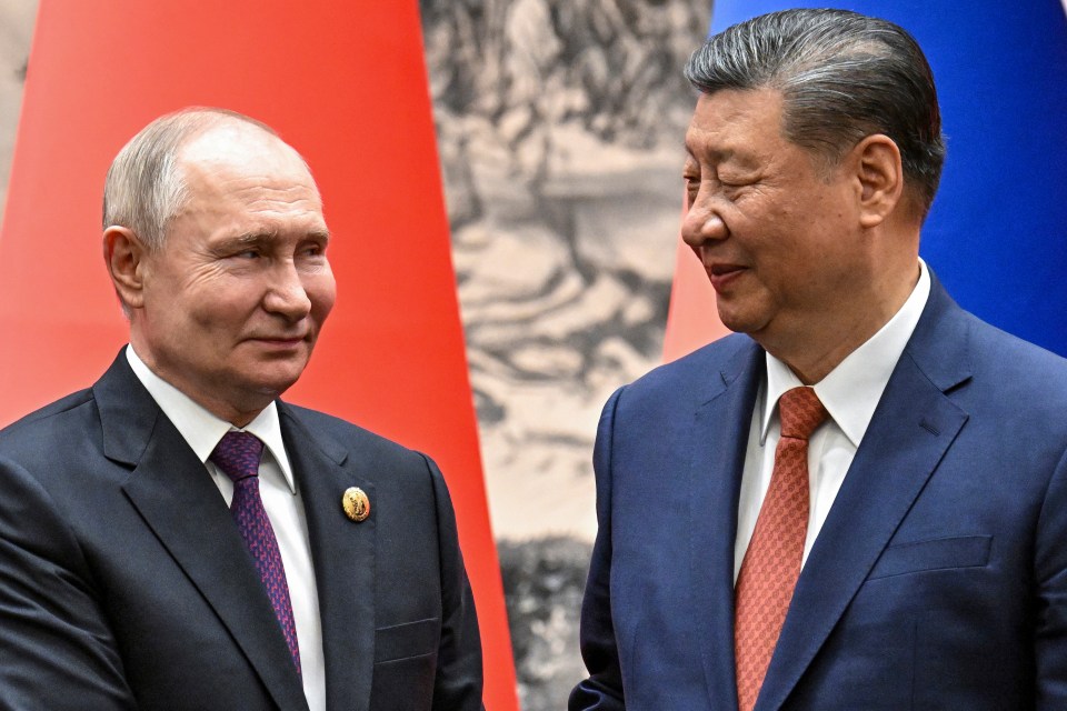 President Vladimir Putin and President Xi Jinping in conversation.