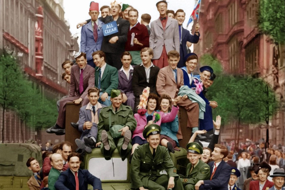 Colourful crowds swarming over an RAF lorry exemplify the patriotic and celebratory spirit of VE Day in London. (8 May 1945) UK: COLOURISED pictures celebrate the 75th anniversary of Britain’s triumph over the Nazi’s. Images show Winston Churchill being swarmed by a sea of joyous Brits, a street party taking place in Manchester and a […]