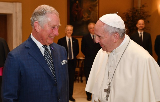 Pope Francis meeting Prince Charles.