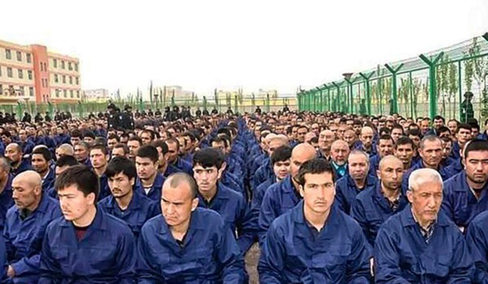Detainees in a Xinjiang re-education camp.