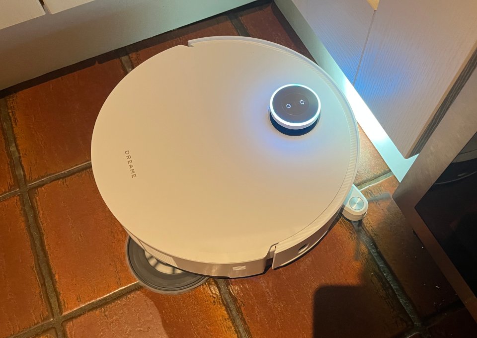 Dreame robot vacuum cleaner on a tile floor.