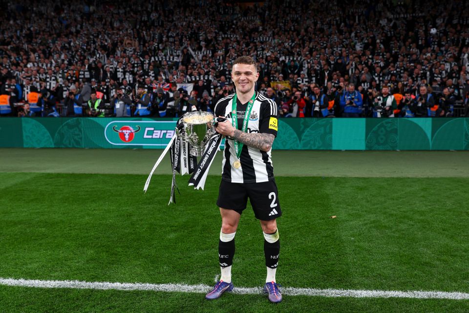 Kieran Trippier of Newcastle United holding the Carabao Cup trophy.