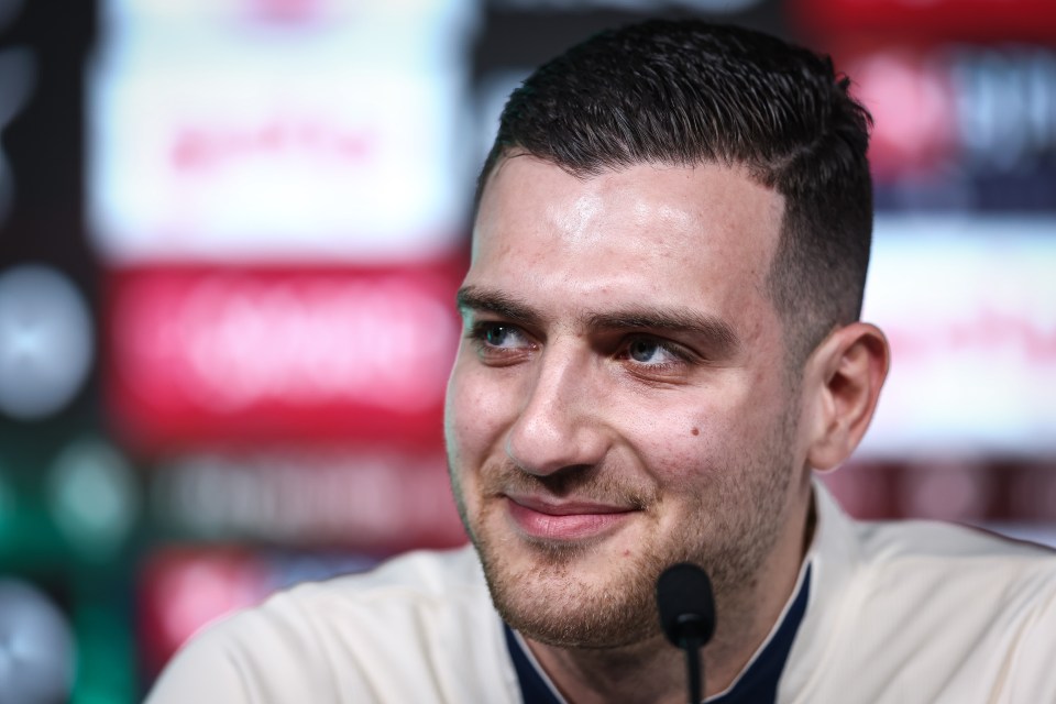 Diogo Dalot at a press conference.