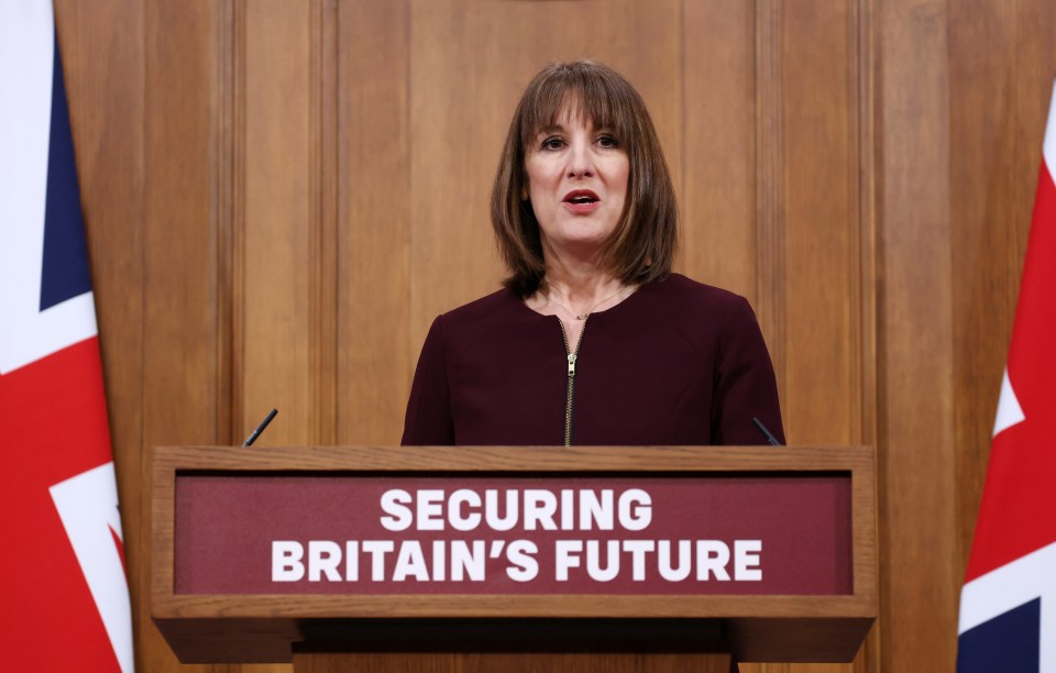 Rachel Reeves giving a speech at a press conference.