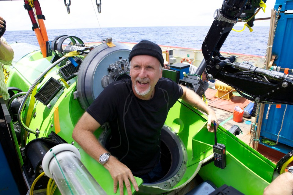 James Cameron emerging from the Deepsea Challenger submersible after a solo dive to the Mariana Trench.