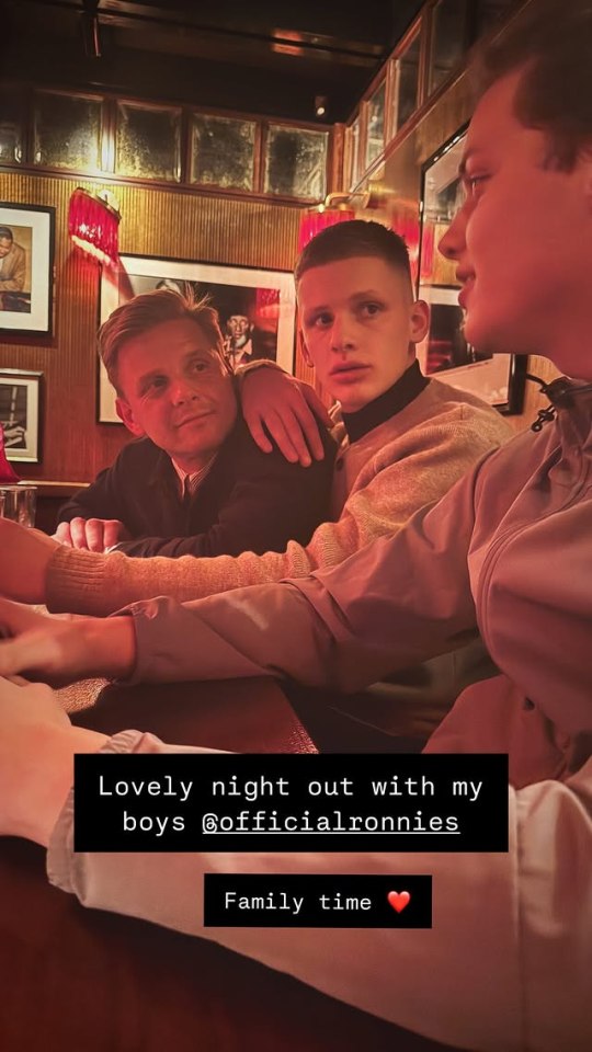 A man and two young men enjoying a night out together.