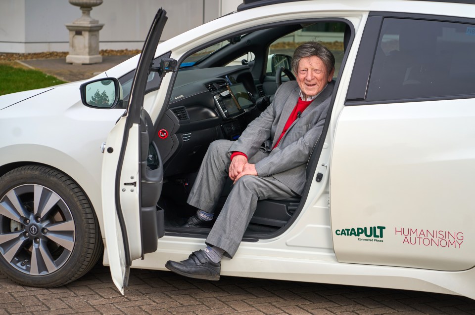 93-year-old comedy writer Brad Ashton in a self-driving Nissan LEAF.