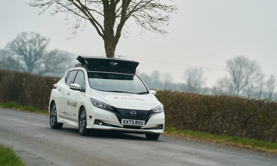 Self-driving Nissan Leaf on a rural road.