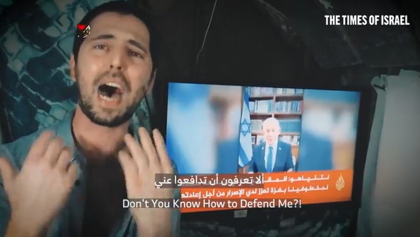 Hostage pleading for release on video, shown alongside Israeli news broadcast.