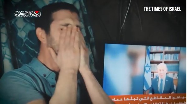 A distressed hostage pleading for release in a Hamas video.