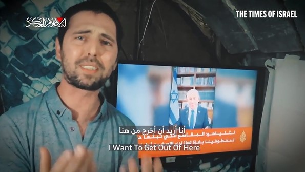 Hostage pleading for release on video.