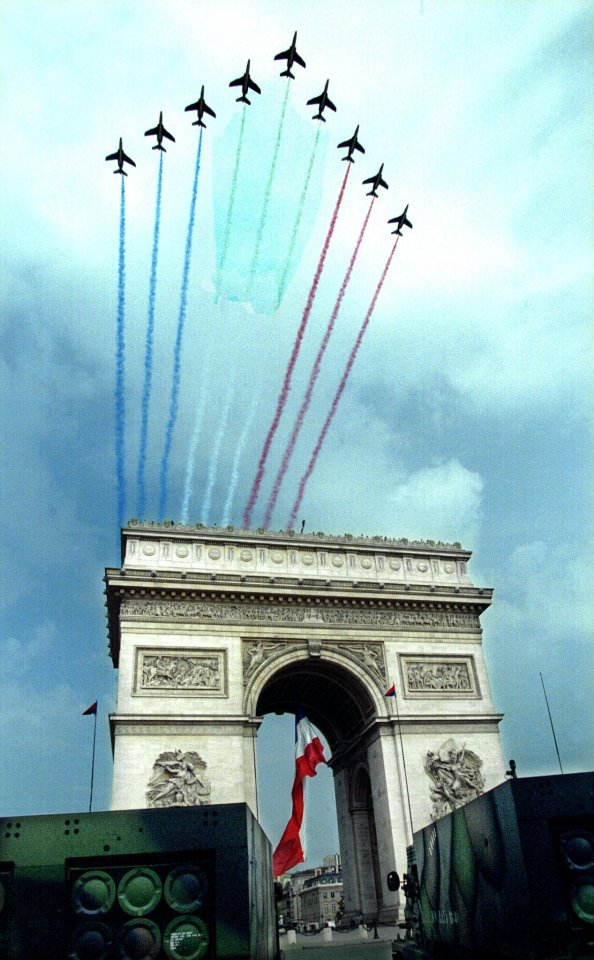 French Air Force Patrouille de France flying over the Arc de Triomphe.