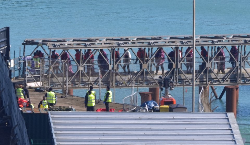 Migrants arriving in Dover, UK, via a Border Force vessel.