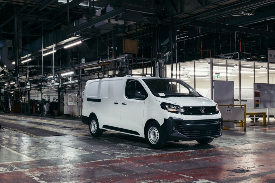 White Vauxhall Vivaro van on a factory floor.