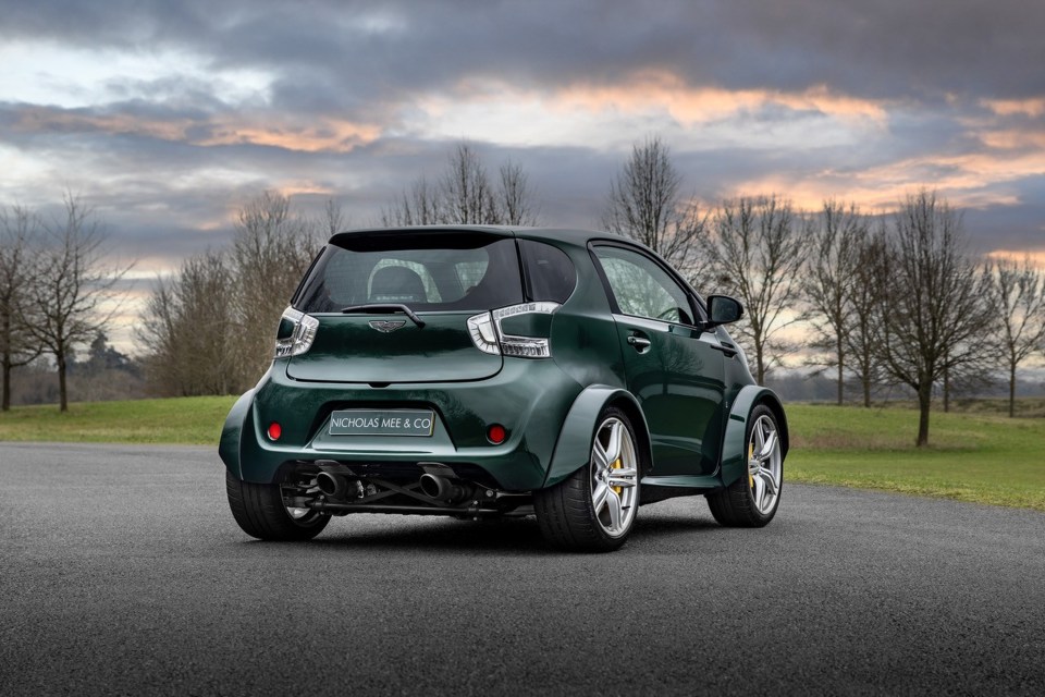 Rear view of a dark green Aston Martin Super Cygnet.