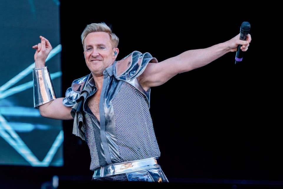 Ian "H" Watkin of Steps performing on stage.