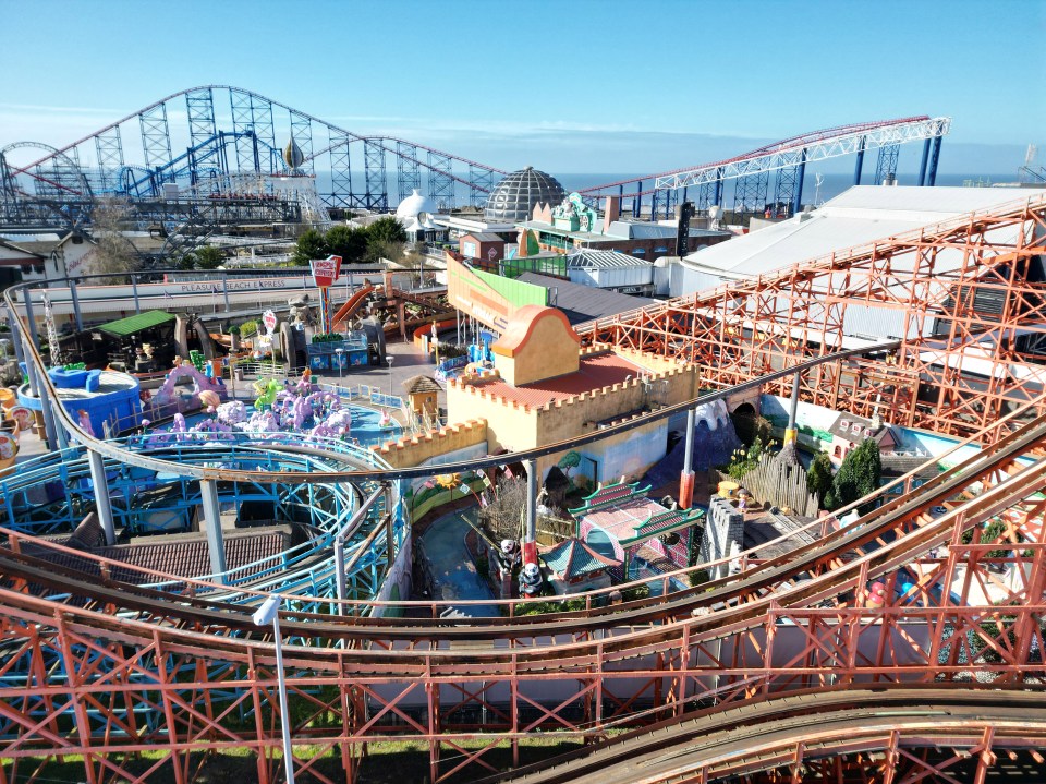 Aerial view of Blackpool Pleasure Beach's rollercoasters and rides.