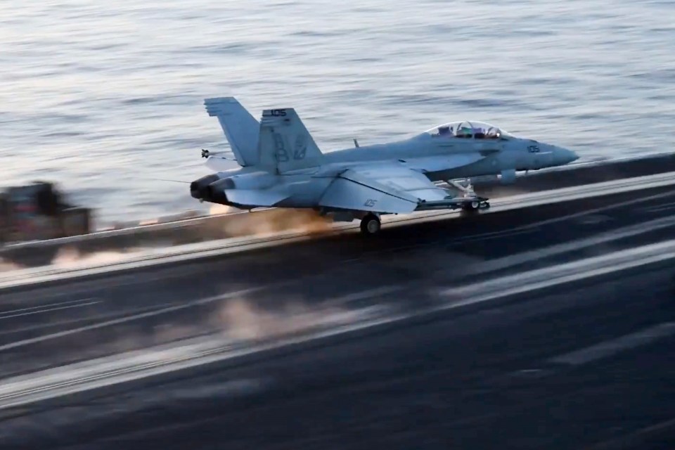 Aircraft launching from aircraft carrier.