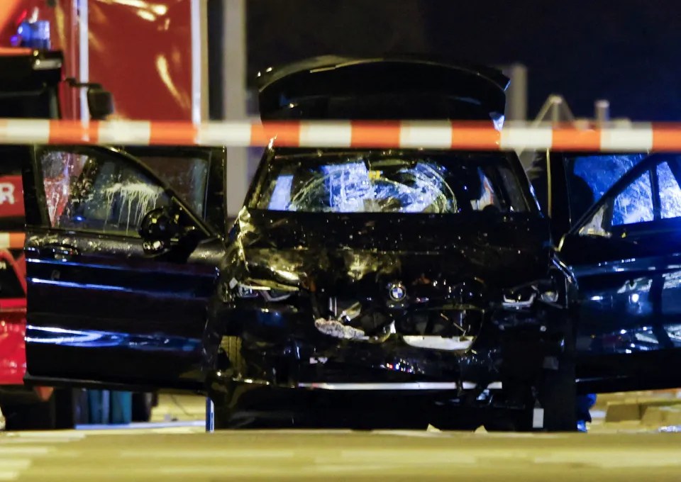 Damaged cars at a crime scene.