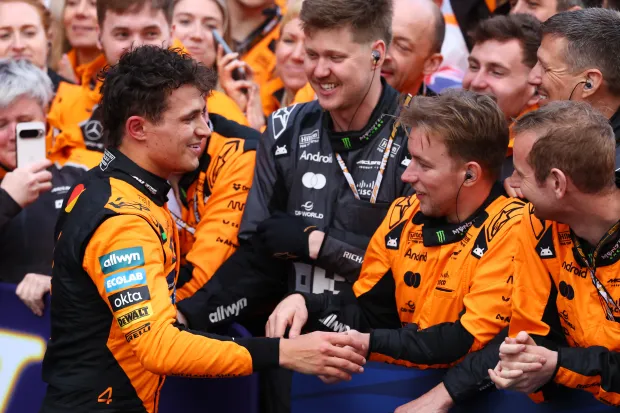 Racing team celebrating.