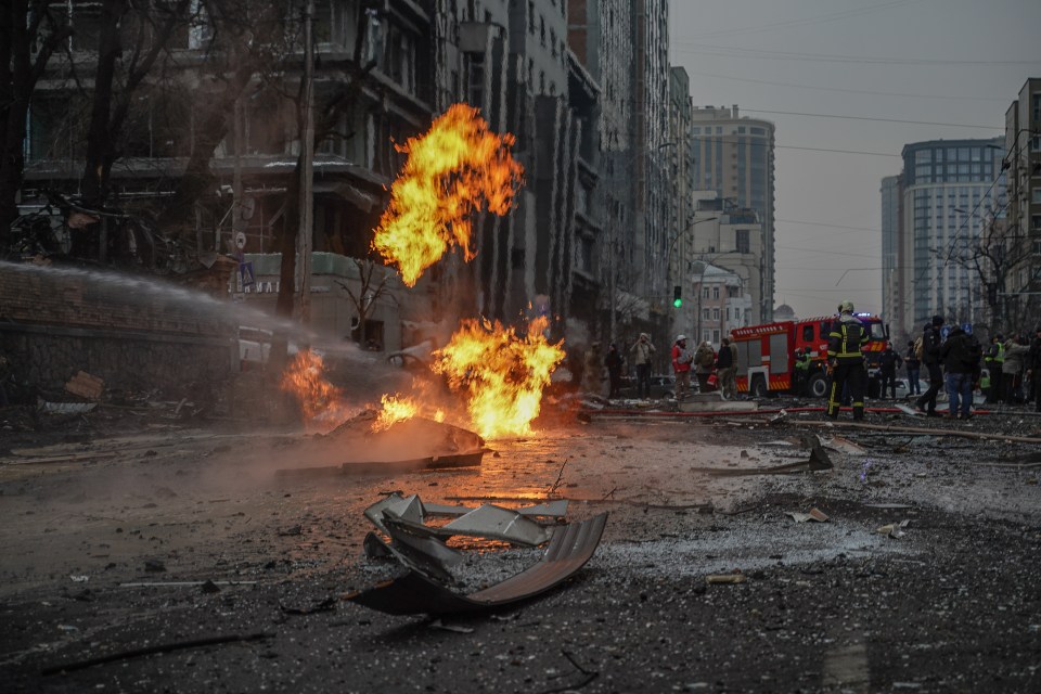 KYIV, UKRAINE - DECEMBER 20: Firefighters work at the site after a Russian missile attack on December 20, 2024 in Kyiv, Ukraine. Russia launched a missile attack on Ukraine's capital, Kyiv, using Iskander/KN-23 ballistic missiles. The strike resulted in damage to buildings and vehicles due to falling missiles' fragments in three districts of the city. At least one person was killed and nine others were injured. (Photo by Yevhenii Vasyliev/Global Images Ukraine via Getty Images)