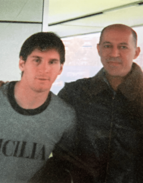 Photo of a young Lionel Messi with a man.
