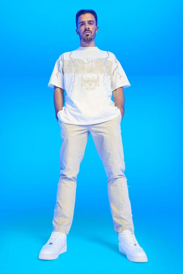 Jack Grealish modeling a BoohooMAN collection.