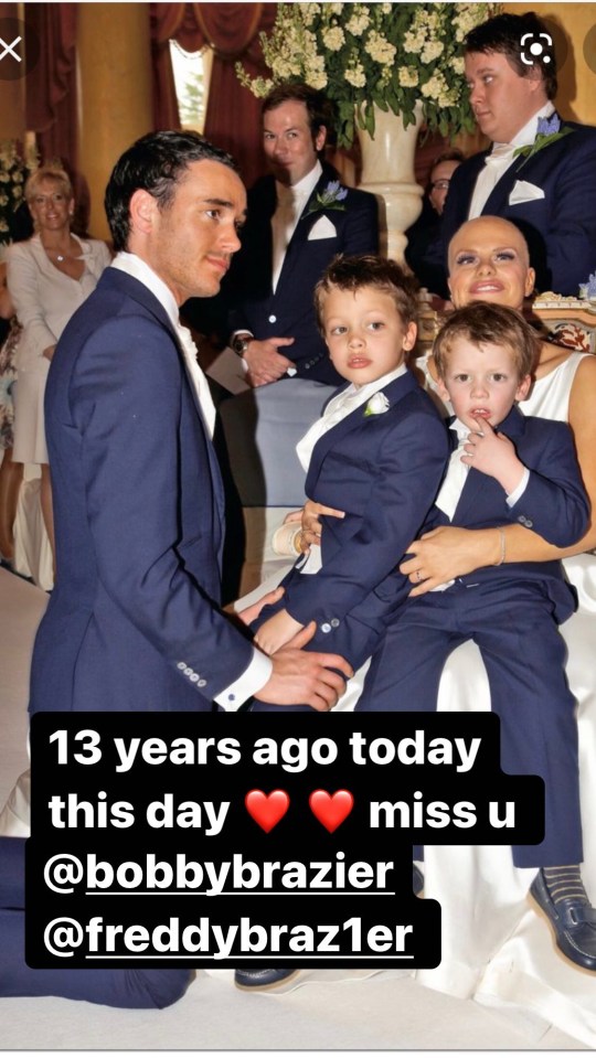 Jack Tweed at a wedding, holding two young boys.
