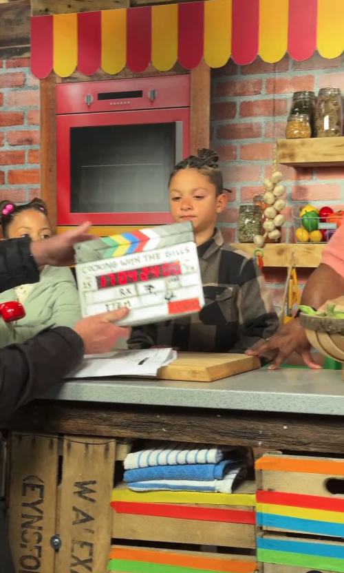 Filming of children on a cooking show.
