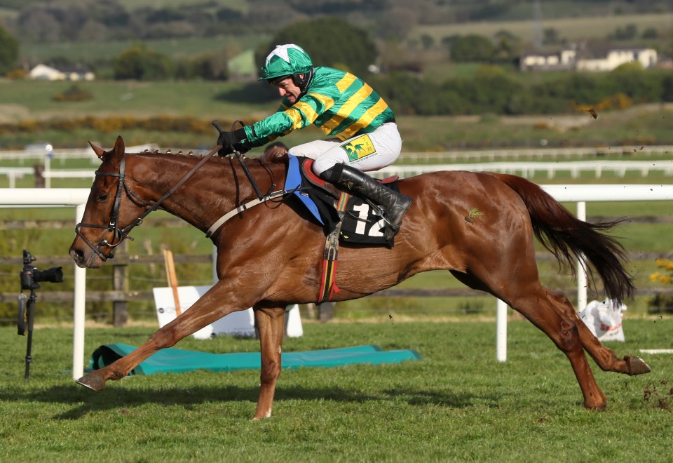 Jockey Jody McGarvey riding Capodanno wins the Conway Piling Handicap Hurdle at Punchestown Racecourse.