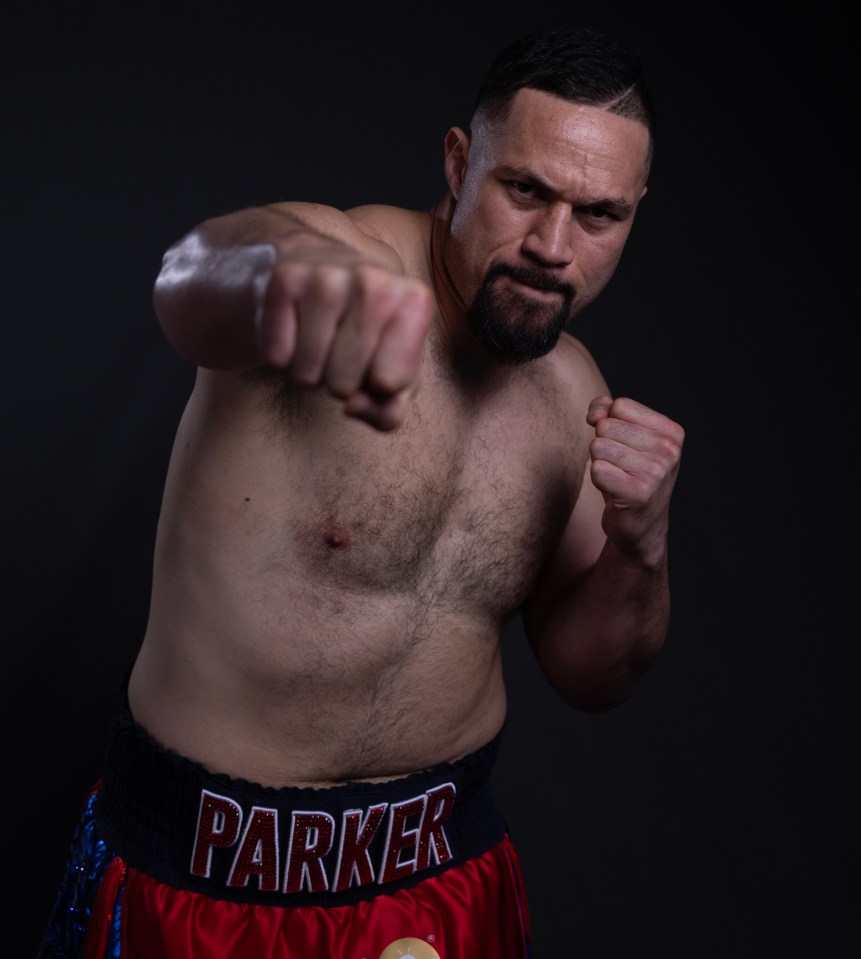 Portrait of Joseph Parker, boxer, throwing a punch.