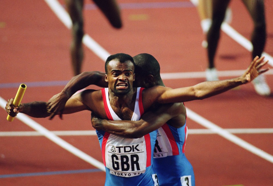 Kris Akabusi of Great Britain crosses the finish line first in the 4 x 400 meter relay race.