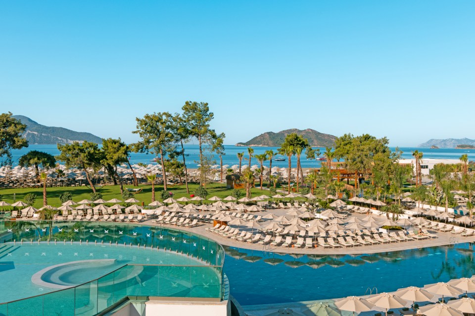 Liberty Signa hotel pool and beach in Fethiye, Turkey.